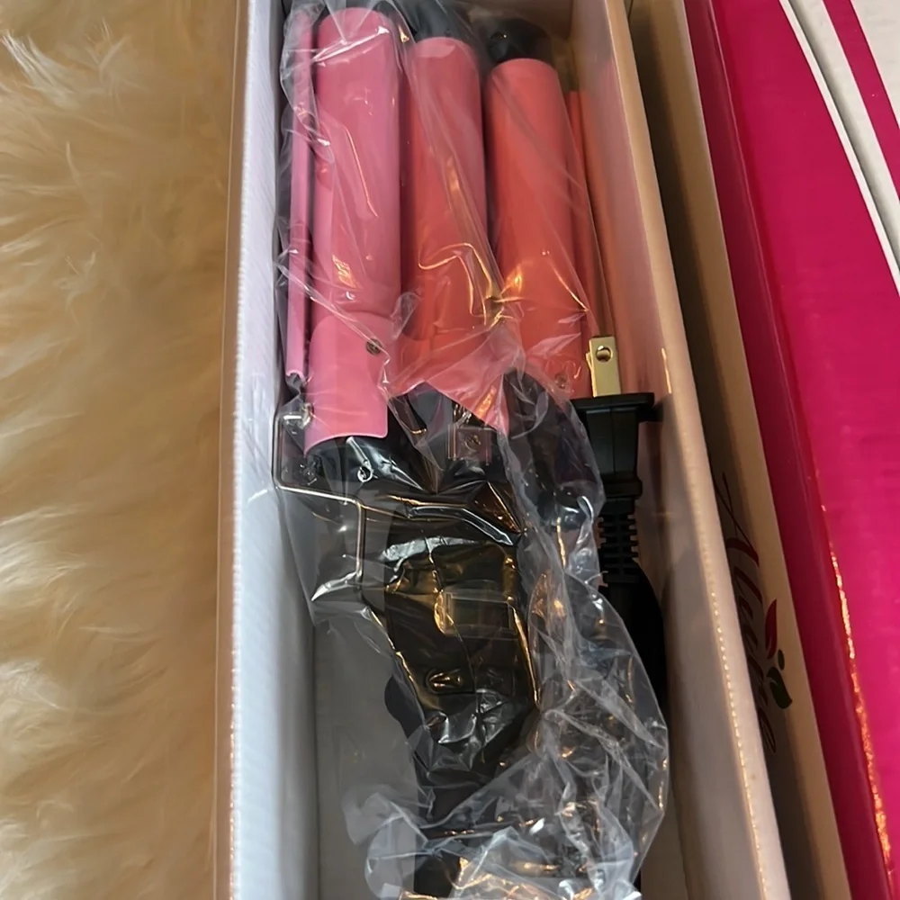 Allure 3 barrel curling iron . New in box